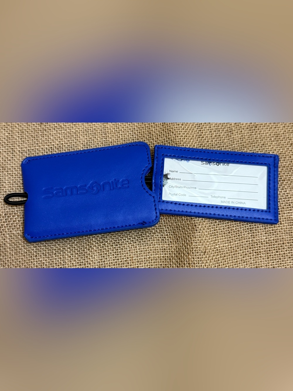Samsonite Royal Blue Embossed Luggage Tag. New with Flaw